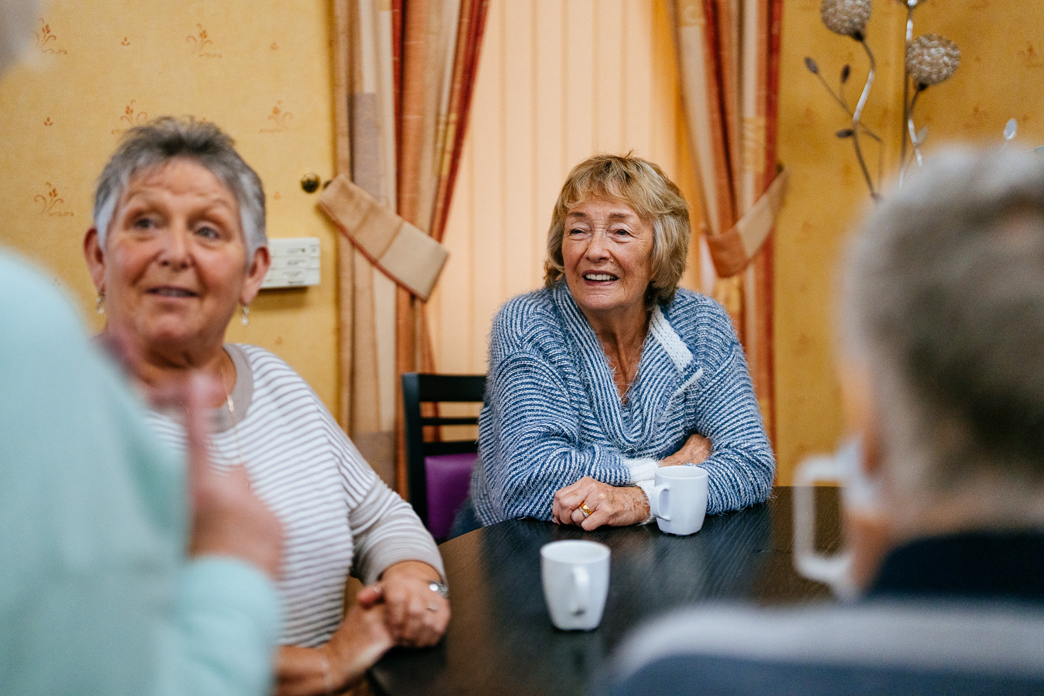 Two female residents at one of our sheltered schemes in Bolton.