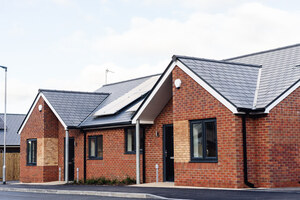 Two of the bungalows at our Lever Gardens Court development in Little Lever, Bolton. There are solar panels on the roof.