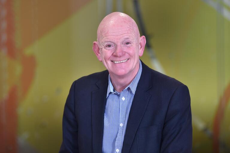 Charles Dunn, a member of our Board.